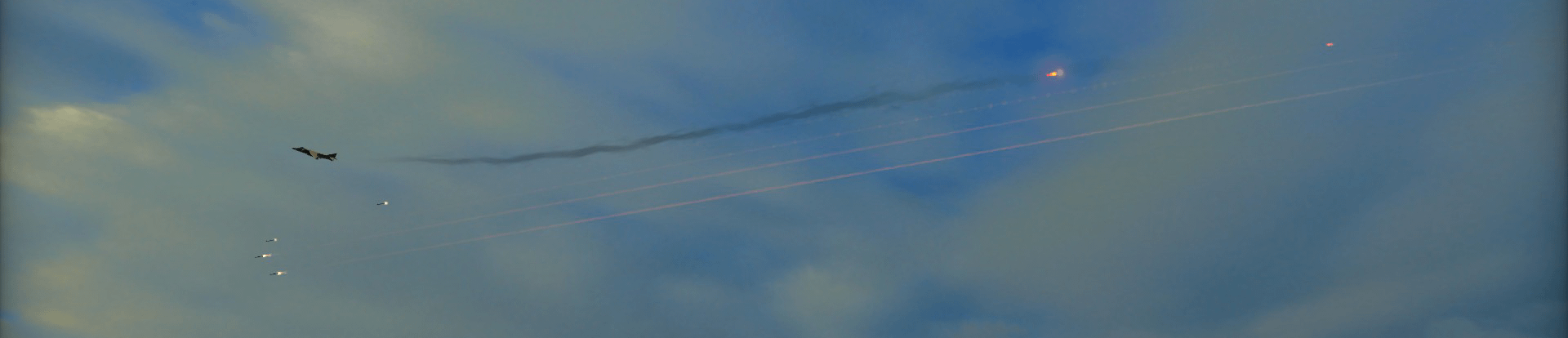 The plane flying towards target firing all LGB